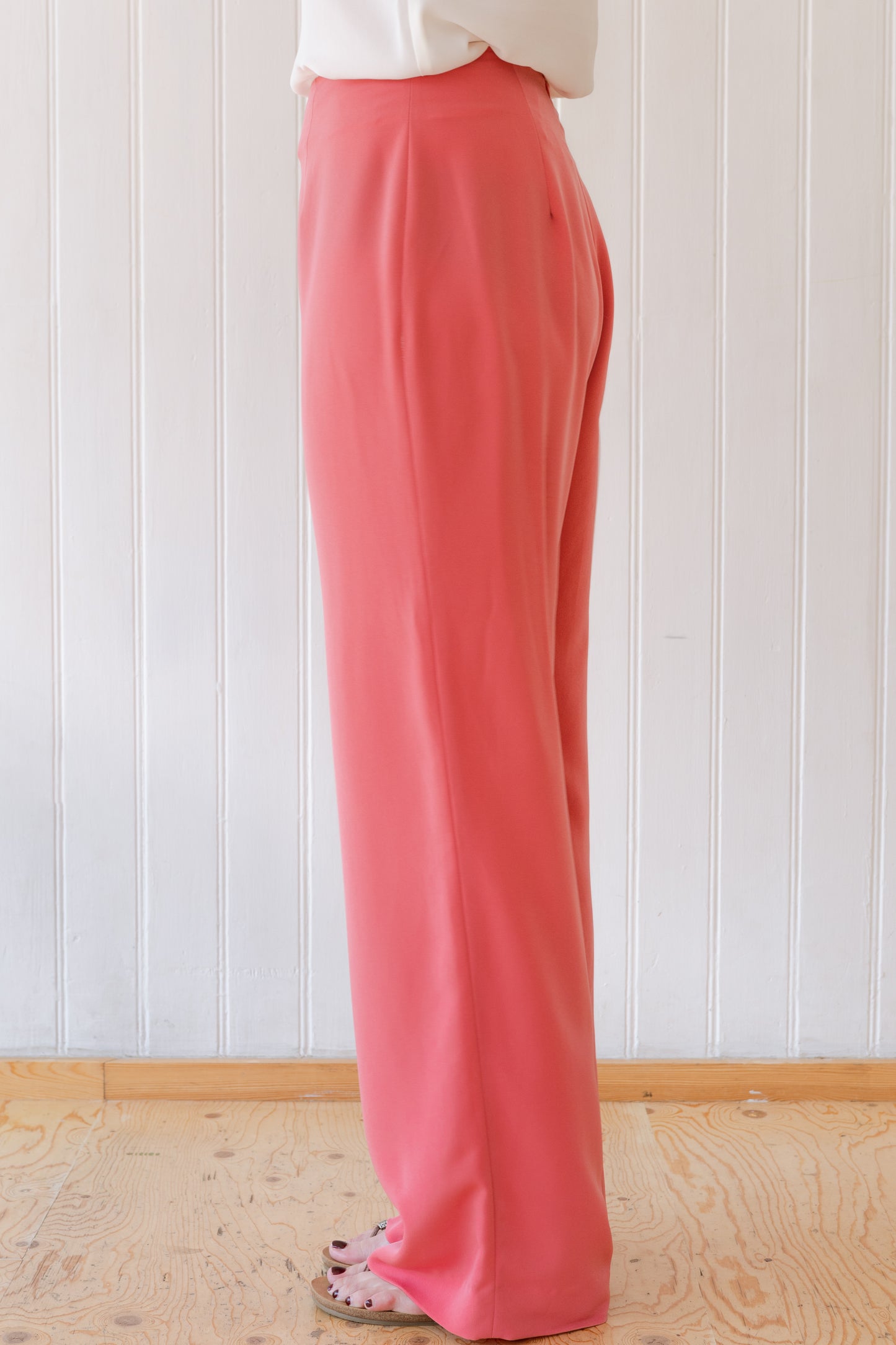 Side view of wide leg vintage inspired trousers.