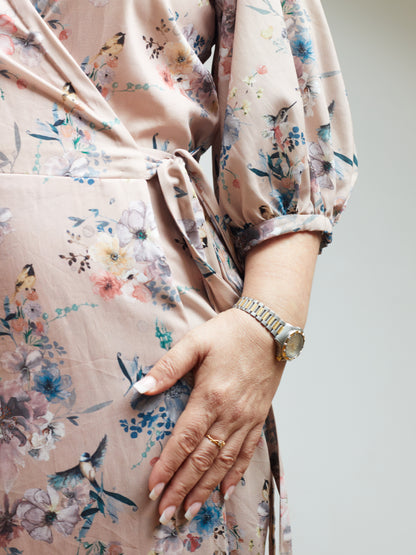 Close up of tie detail featuring on a vintage inspired wrap dress.