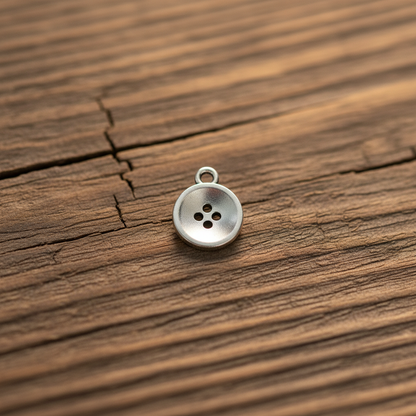 Button charm on wood