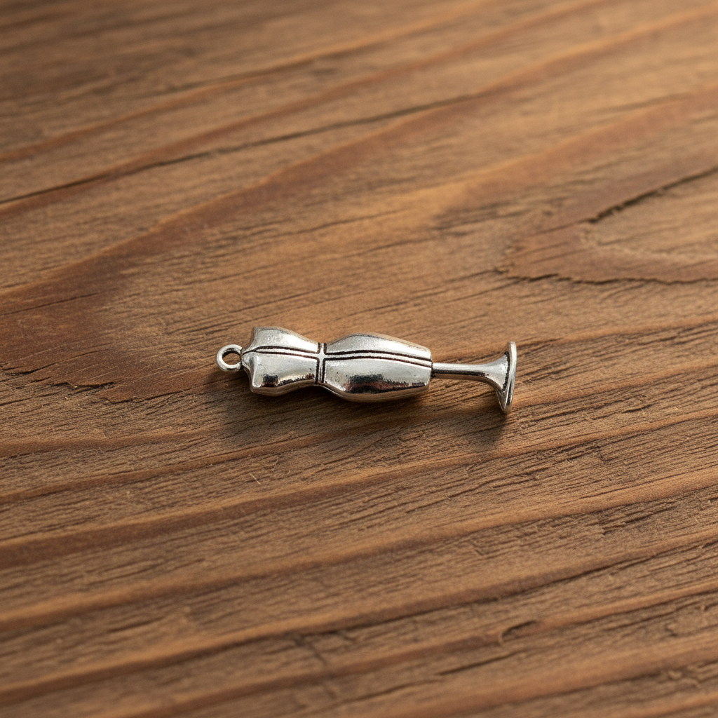 Mannequin charm lying down on wood