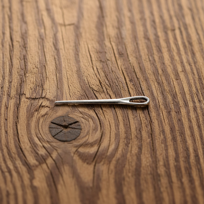 Needle charm on wood