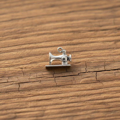 Sewing machine charm on wood